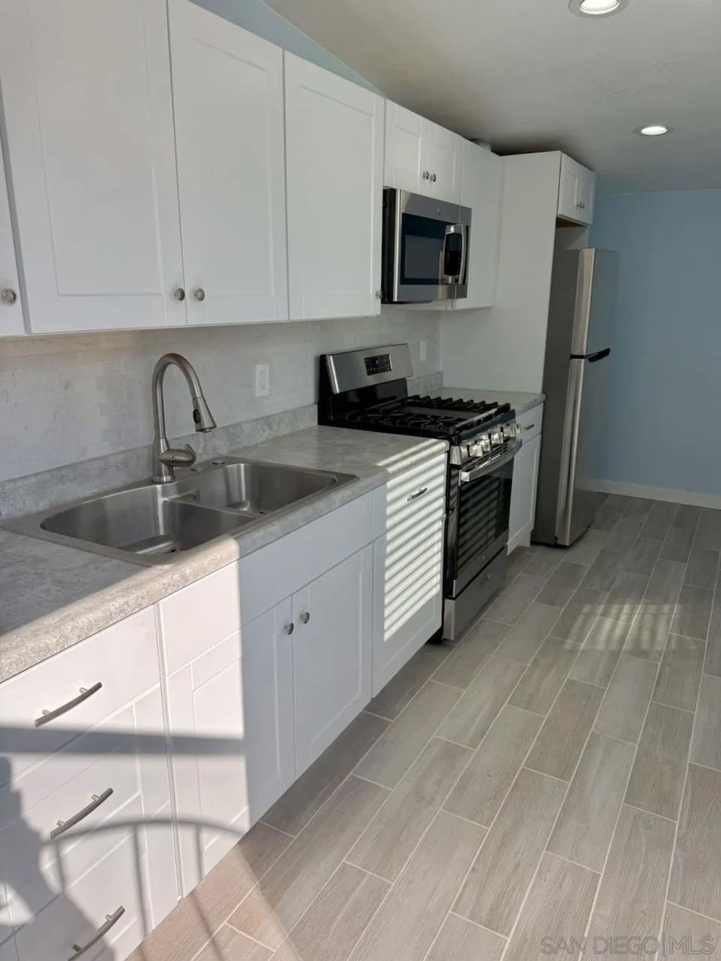 Photo of 3112 W Virgo Rd, San Diego, CA 92105 (MLS # 250045085)