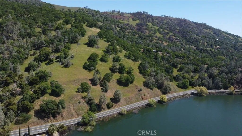 Photo of 9725 E Highway 20, Clearlake Oaks, CA 95423 (MLS # LC25277941)