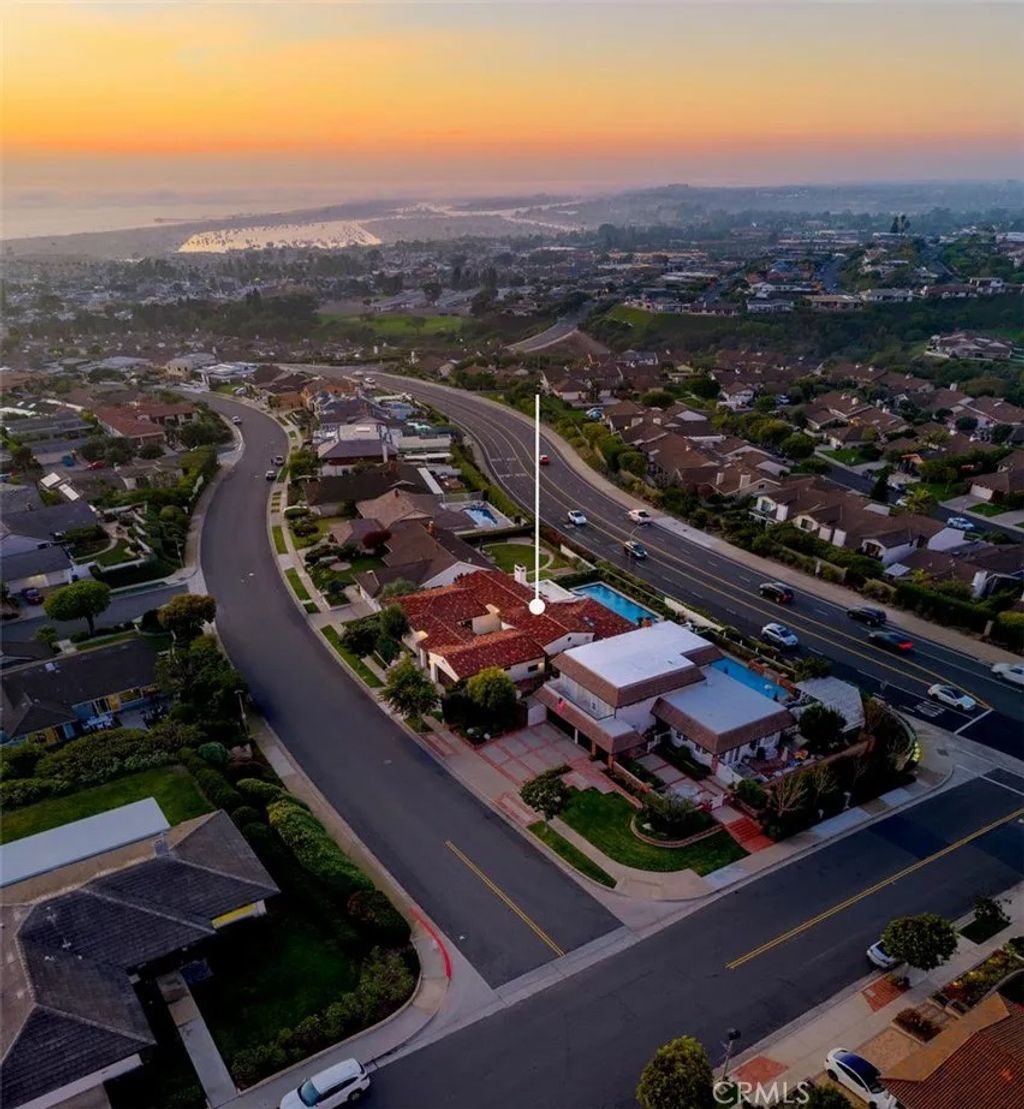 Photo of 1033 Tiller Way, Corona Del Mar, CA 92625 (MLS # NP25278283)