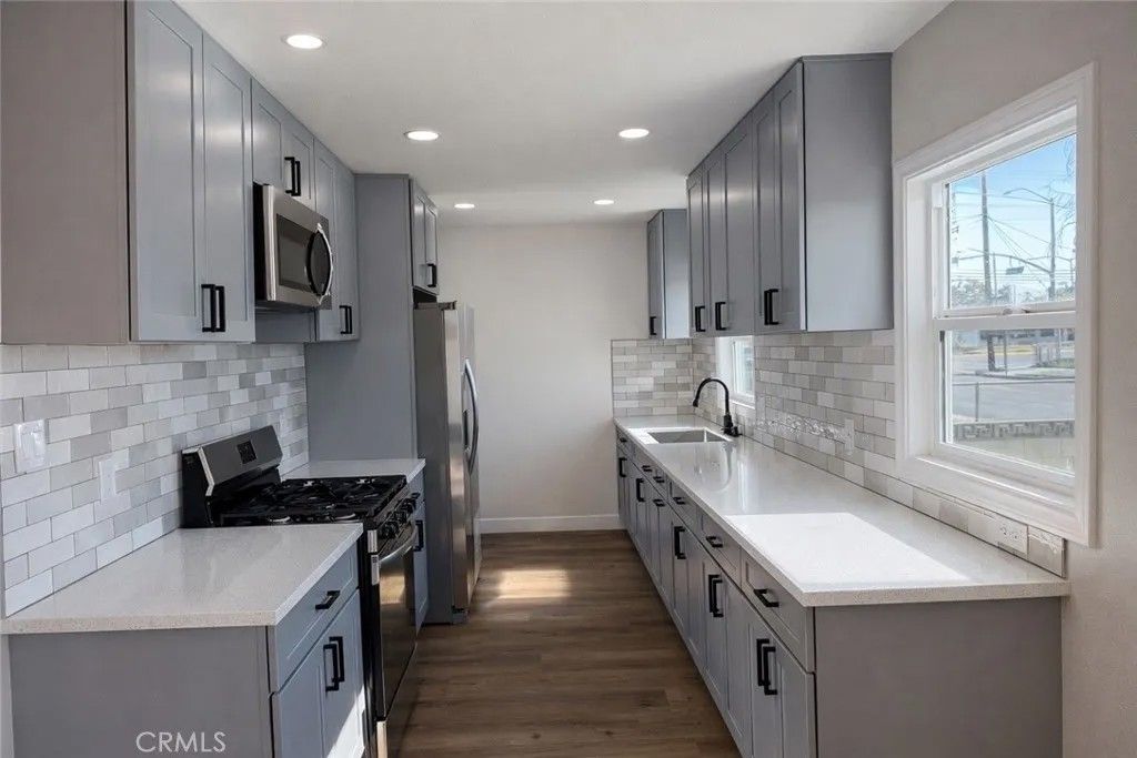 Photo of 813 W Stockwell St, Compton, CA 90222 (MLS # IG26025613)