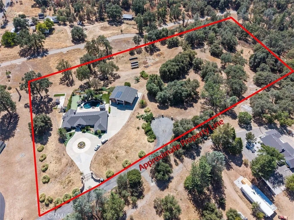Photo of 49344 Deerview Lane, Oakhurst, CA 93644 (MLS # FR26207008)