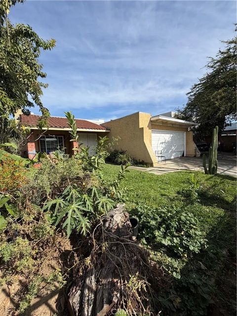 Photo of 203 S 4th, La Puente, CA 91746 (MLS # CV26088811)