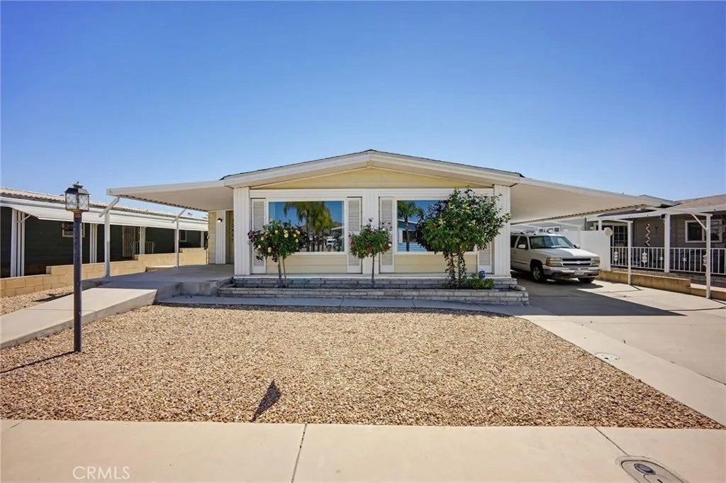 Photo of 30857 Silver Palm Dr, Homeland, CA 92548 (MLS # PW26082008)