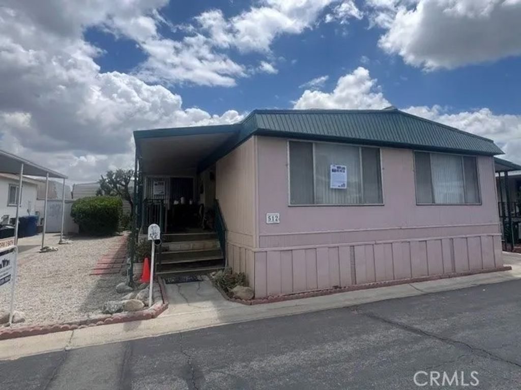 Photo of 8811 Canoga Park #512, Canoga Park, CA 91304 (MLS # SR26111054)