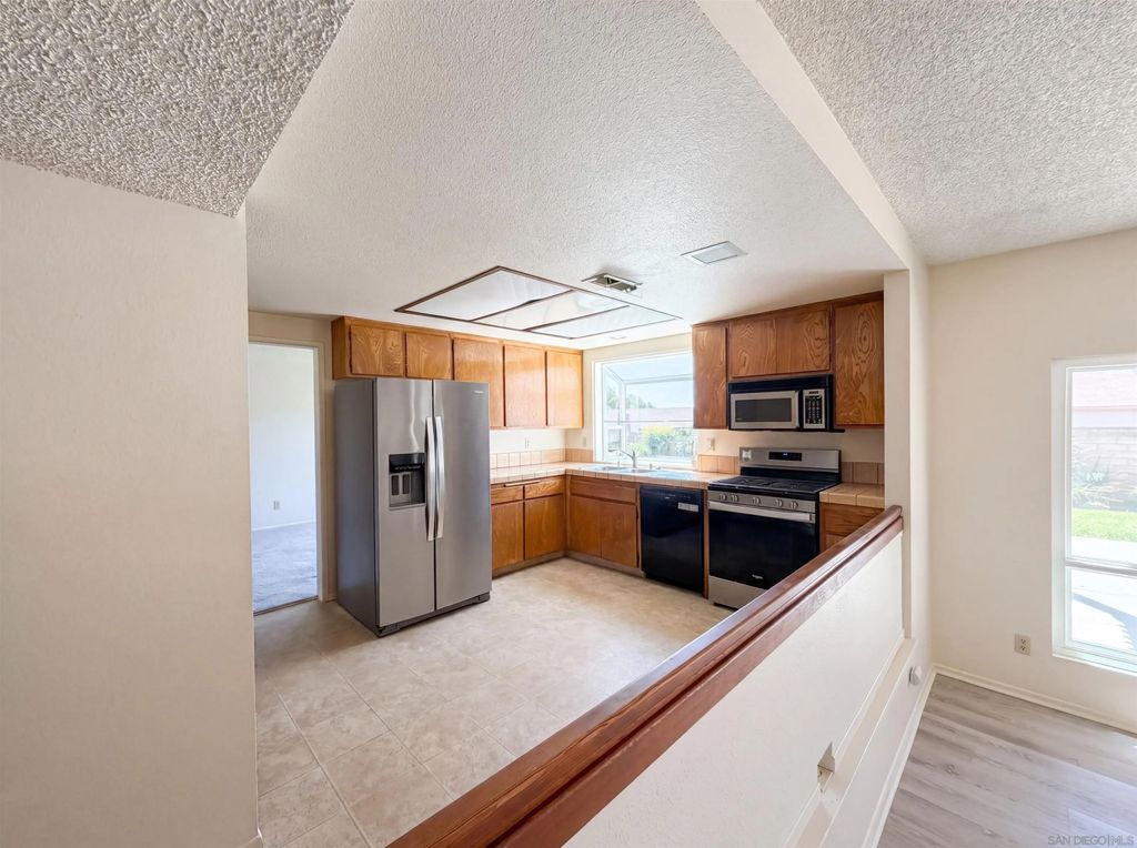 Photo of 8949 Corte Pellejo, Spring Valley, CA 91977 (MLS # 260011210)