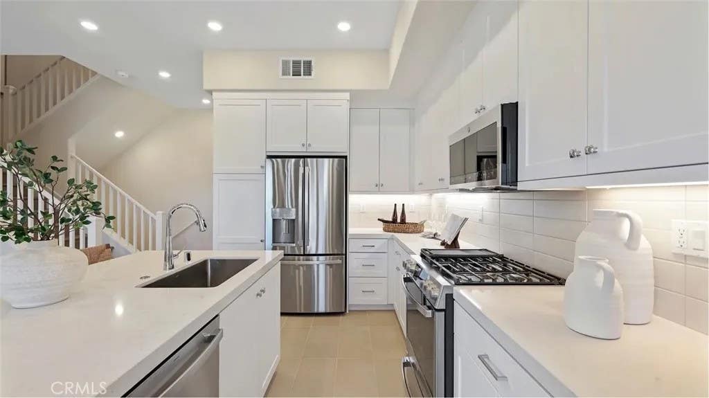 Photo of 1345 Snowberry Place, Montebello, CA 90640 (MLS # OC26048446)