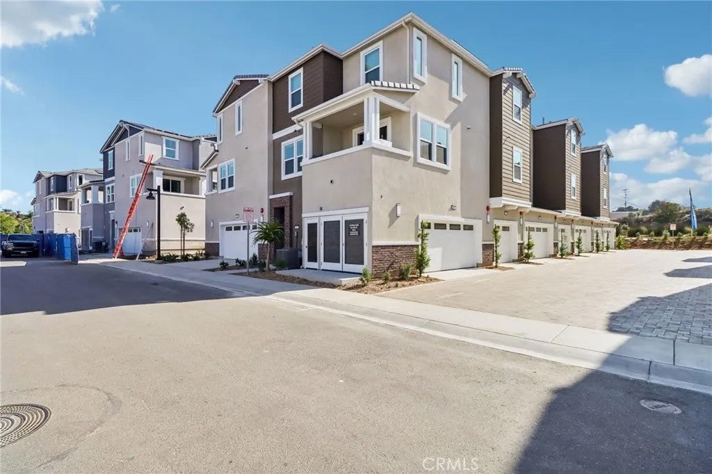Photo of 403 Lotus Drive, San Marcos, CA 92069 (MLS # OC26122512)