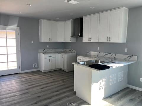 Photo of 1215 W 104 ST, Los Angeles, CA 90044 (MLS # PW26135607)