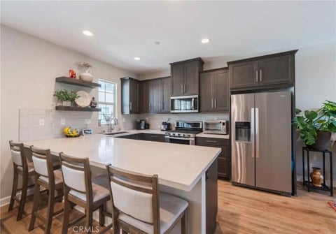 Photo of 102 Lantana Drive, Stanton, CA 90680 (MLS # OC26079117)