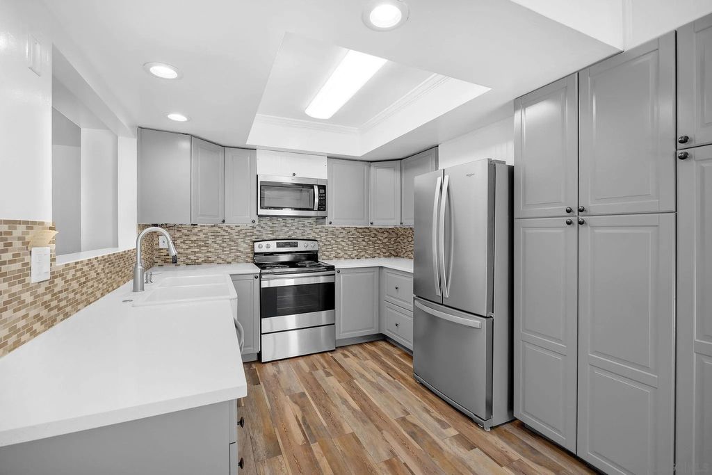 Photo of 687 Ascot Drive #H, Vista, CA 92083 (MLS # 260011300)