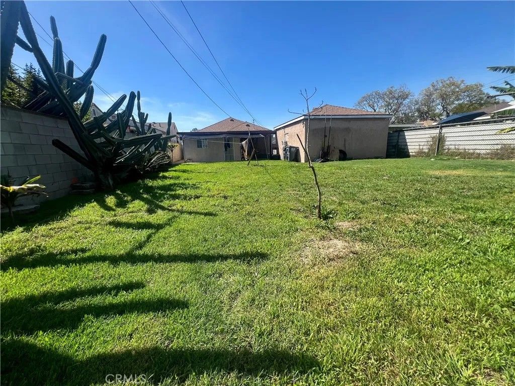 Photo of 822 S Chester Ave, Compton, CA 90221 (MLS # PT26061752)