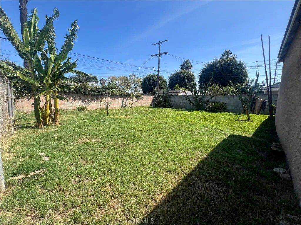 Photo of 822 S Chester Ave, Compton, CA 90221 (MLS # PT26061752)