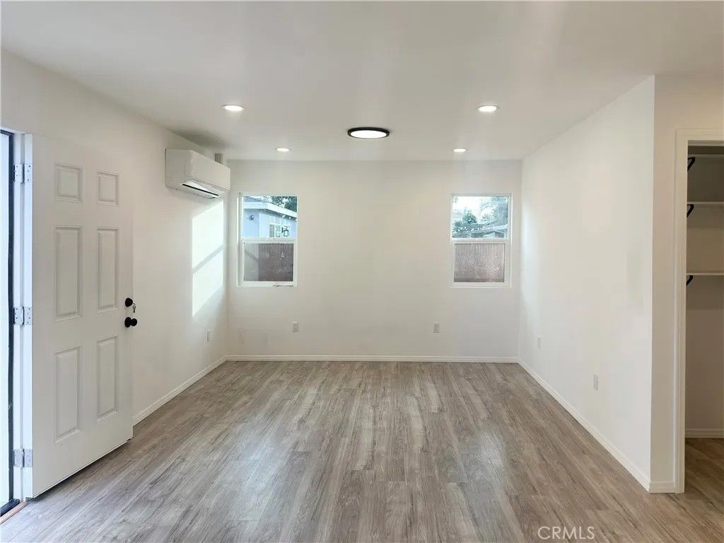 Photo of 7642 Arnett St #A, Downey, CA 90241 (MLS # DW25249149)