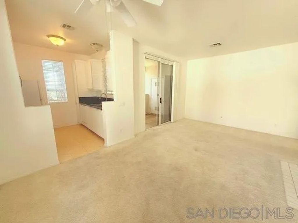 Photo of 10884 Sabre Hill Drive #310, San Diego, CA 92128 (MLS # 250045156)
