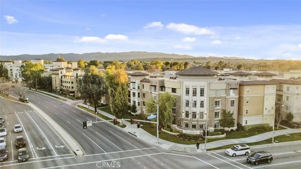 Photo of 24507 Town Center Drive #7318, Valencia, CA 91355 (MLS # SR26007394)