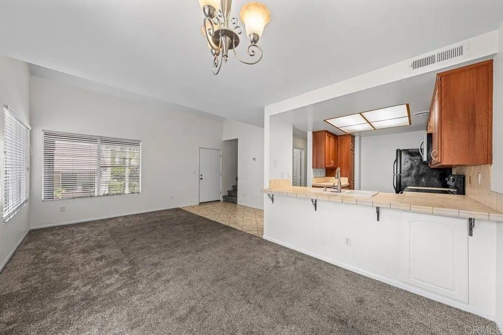 Photo of 5430 Baltimore Drive #16, La Mesa, CA 91942 (MLS # PTP2602388)