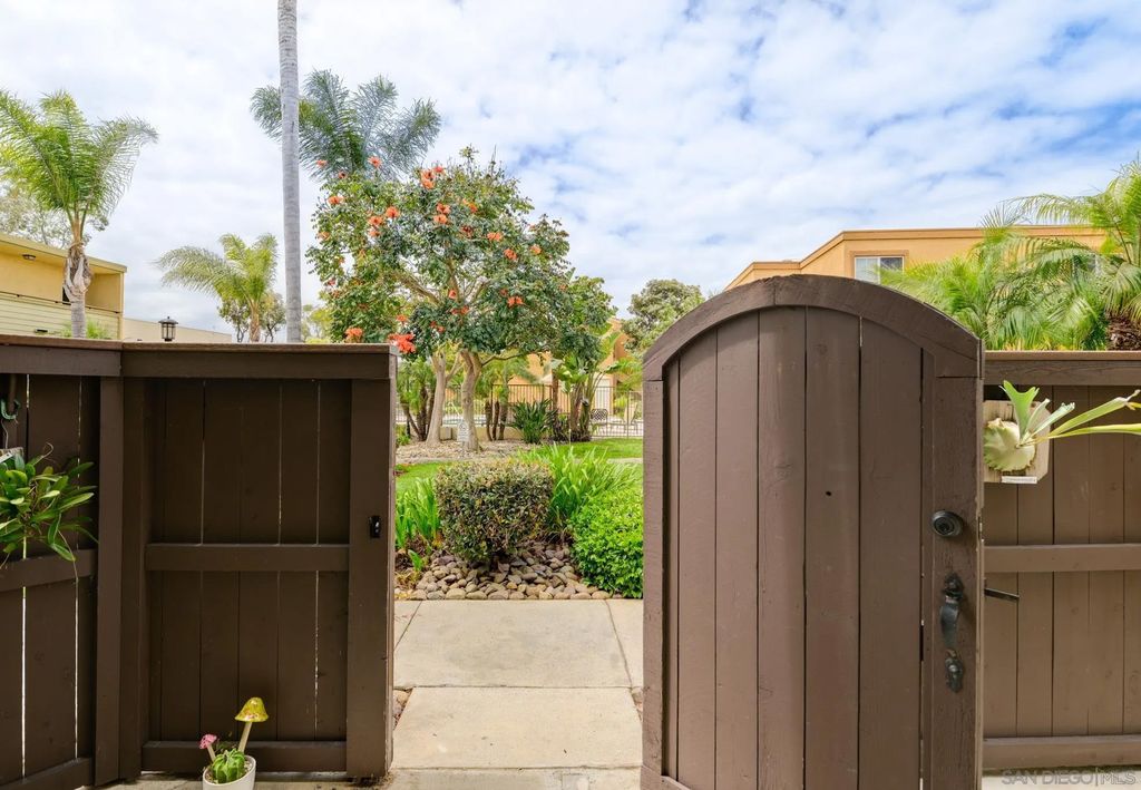 Photo of 5402 Balboa Arms Dr #348, San Diego, CA 92117 (MLS # 260010277)