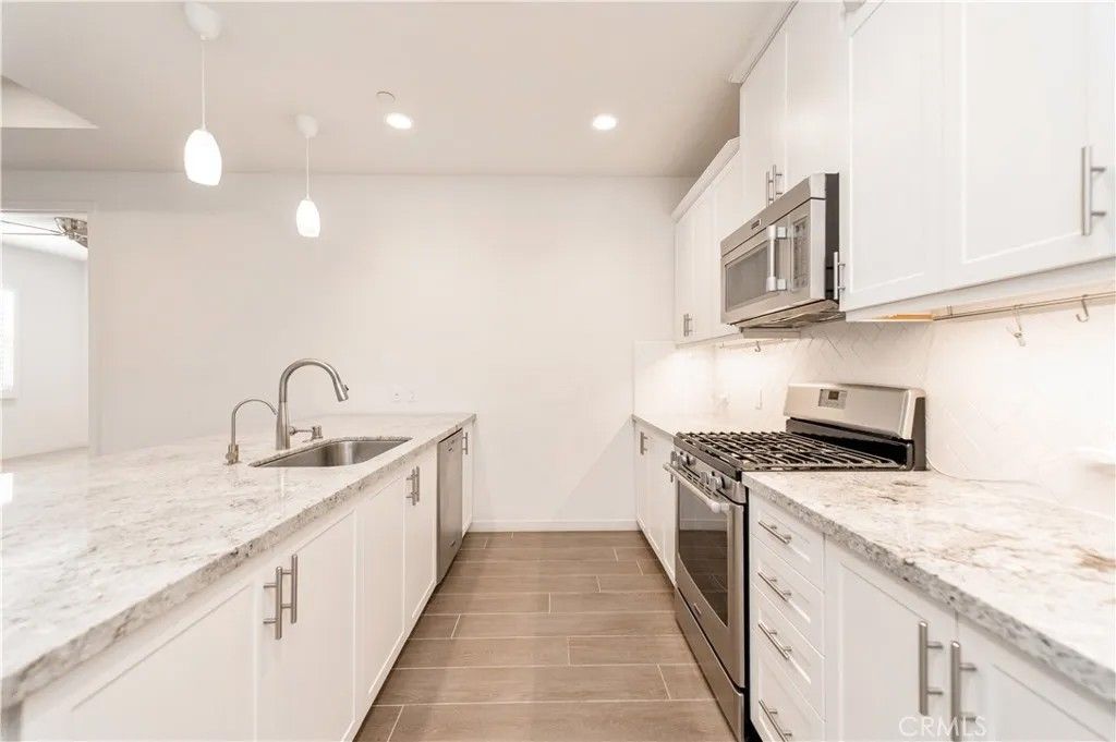 Photo of 407 Trailblaze, Irvine, CA 92618 (MLS # OC25275869)