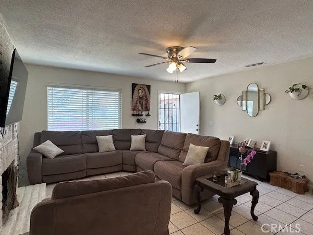 Photo of 7714 Acacia St, Fontana, CA 92336 (MLS # TR26031081)