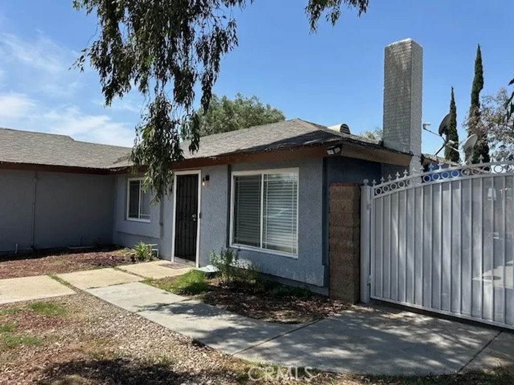 Photo of 7714 Acacia St, Fontana, CA 92336 (MLS # TR26031081)