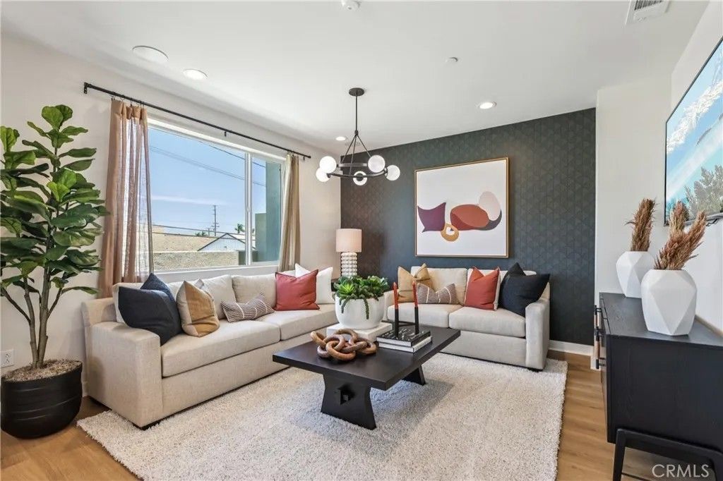 Photo of 11714 Arkansas Street #A, Artesia, CA 90701 (MLS # OC25272415)