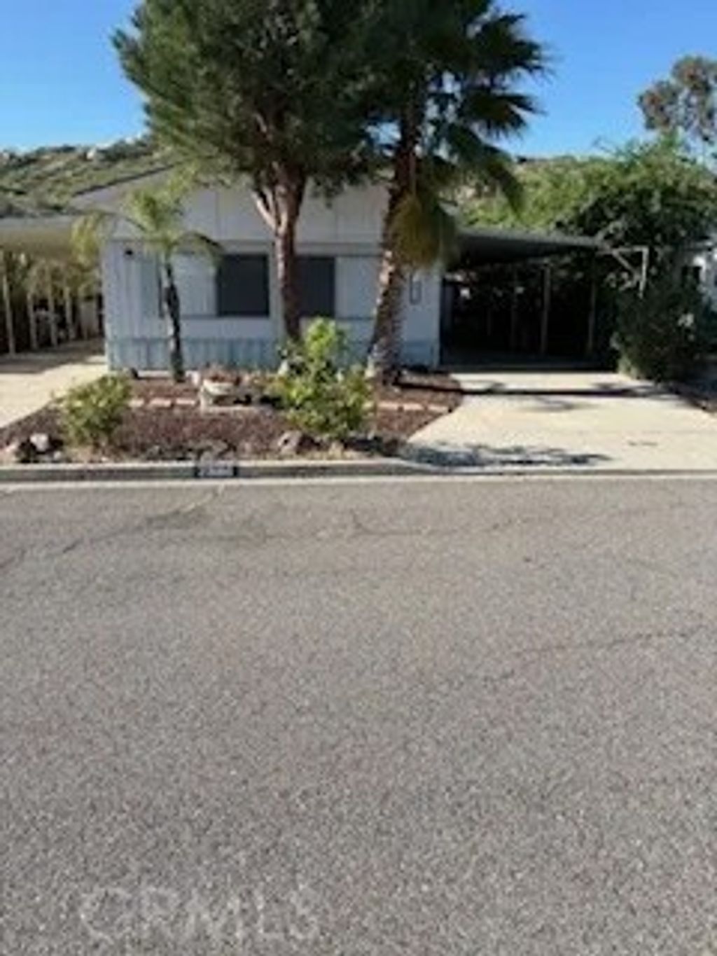 Photo of 23186 Skylink Dr, Canyon Lake, CA 92587 (MLS # IV26052547)