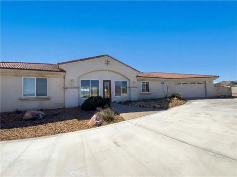 Photo of 6057 Buena Suerte Rd, Yucca Valley, CA 92284 (MLS # IV26039894)
