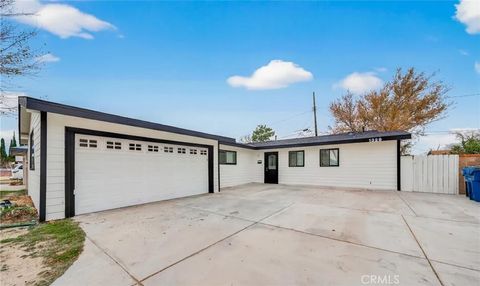 Photo of 1329 Indian Sage Rd, Lancaster, CA 93534 (MLS # OC25269621)