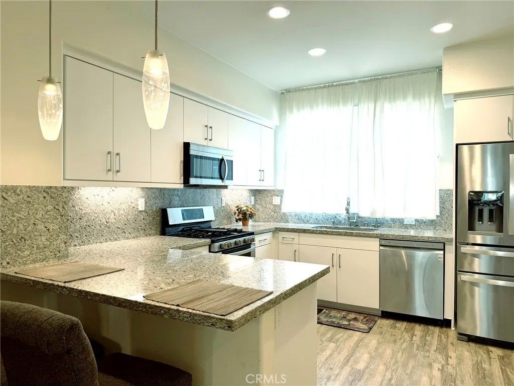 Photo of 9044 E Garvey Avenue #20, Rosemead, CA 91770 (MLS # TR26091970)