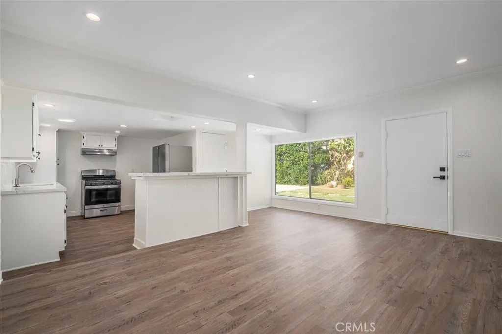 Photo of 1228 S Dunsmuir AVE, Los Angeles, CA 90019 (MLS # SB26103197)