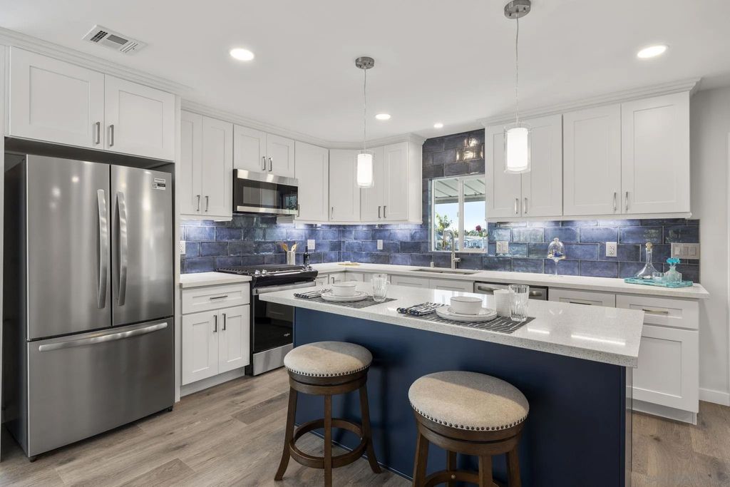 Photo of 7102 San Bartolo St #11, Carlsbad, CA 92011 (MLS # 260008956)