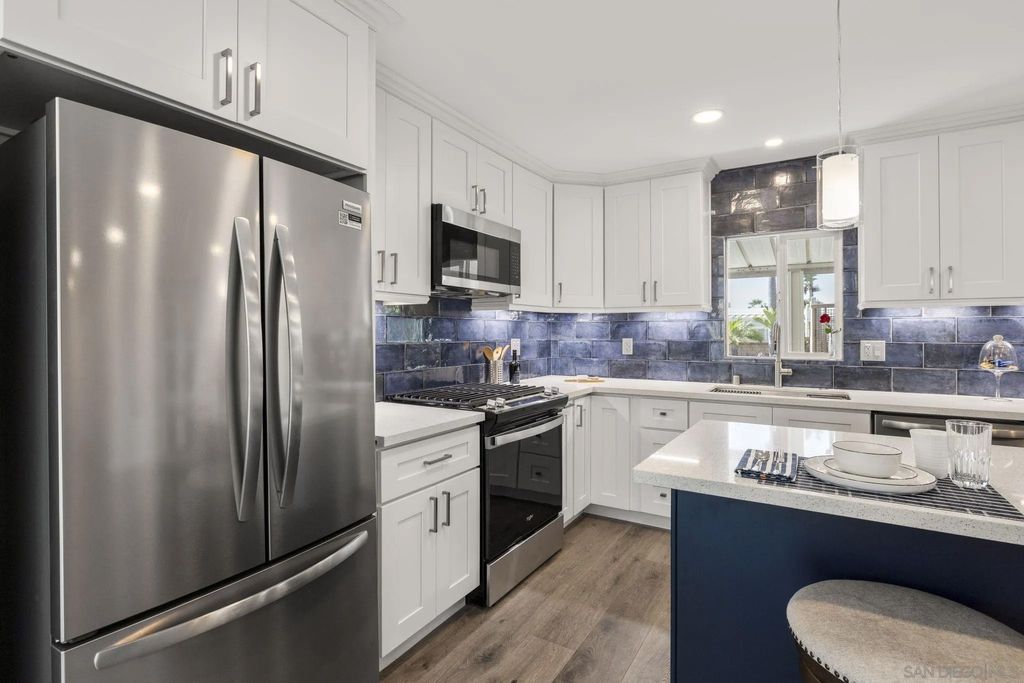 Photo of 7102 San Bartolo St #11, Carlsbad, CA 92011 (MLS # 260008956)