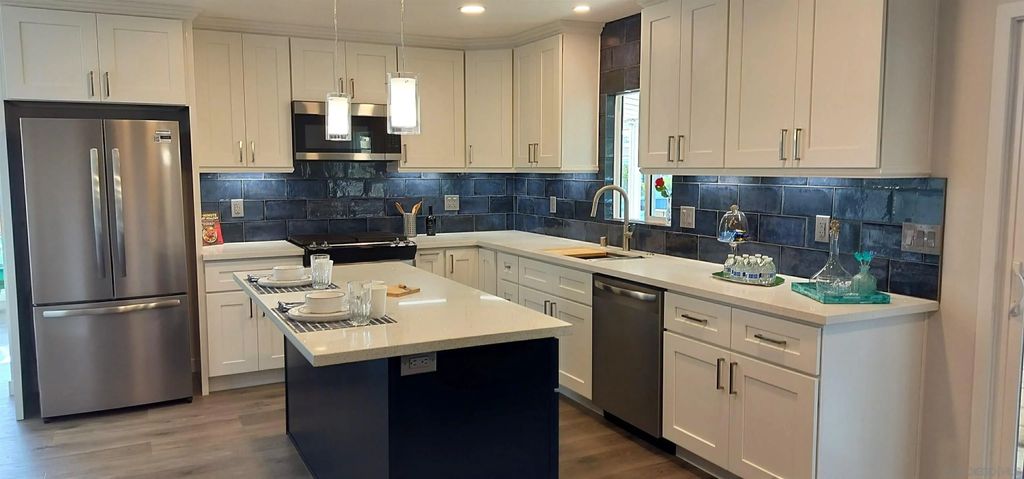 Photo of 7102 San Bartolo St #11, Carlsbad, CA 92011 (MLS # 260008956)