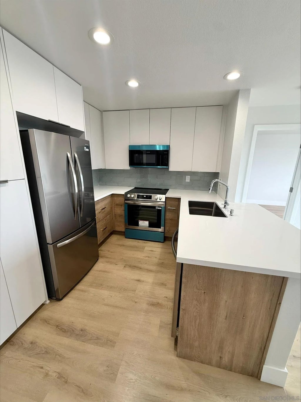 Photo of 3020 Cowley Way #207, San Diego, CA 92117 (MLS # 260025068)