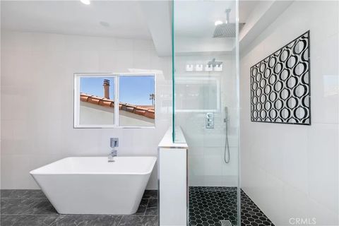 Tiny photo for 4651 Los Patos Ave, Huntington Beach, CA 92649 (MLS # IG25271901)