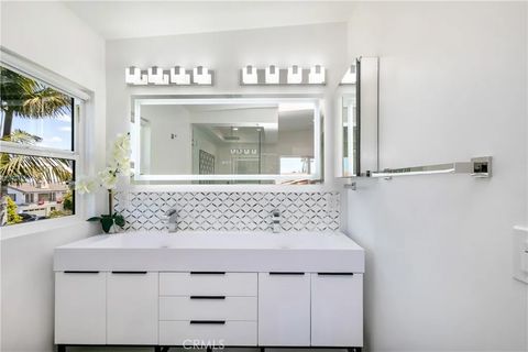 Tiny photo for 4651 Los Patos Ave, Huntington Beach, CA 92649 (MLS # IG25271901)