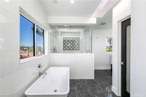 Tiny photo for 4651 Los Patos Ave, Huntington Beach, CA 92649 (MLS # IG25271901)