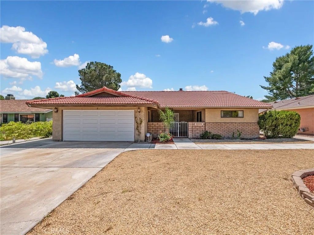 Photo of 15163 Tournament Drive, Helendale, CA 92342 (MLS # HD26077829)