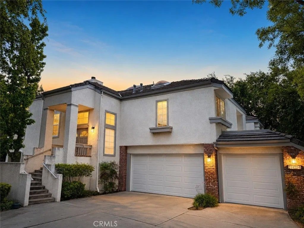 Photo of 24422 Hampton Dr #A, Valencia, CA 91355 (MLS # SR26095633)
