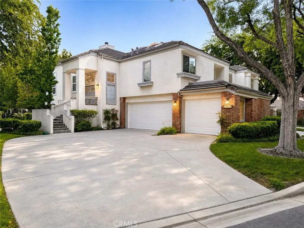 Photo of 24422 Hampton Dr #A, Valencia, CA 91355 (MLS # SR26095633)