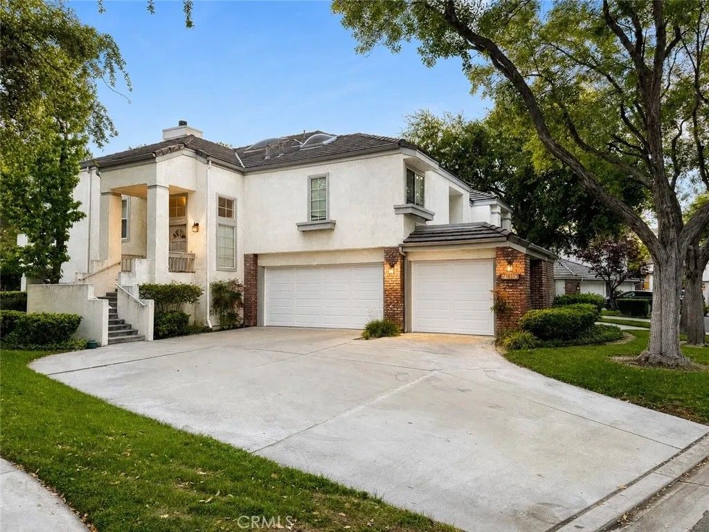 Photo of 24422 Hampton Dr #A, Valencia, CA 91355 (MLS # SR26095633)