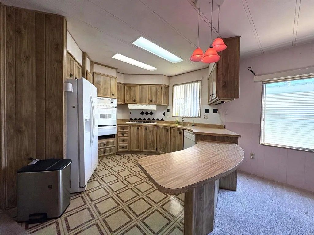 Photo of 7467 Mission Gorge Rd #293, Santee, CA 92071 (MLS # PTP2507873)