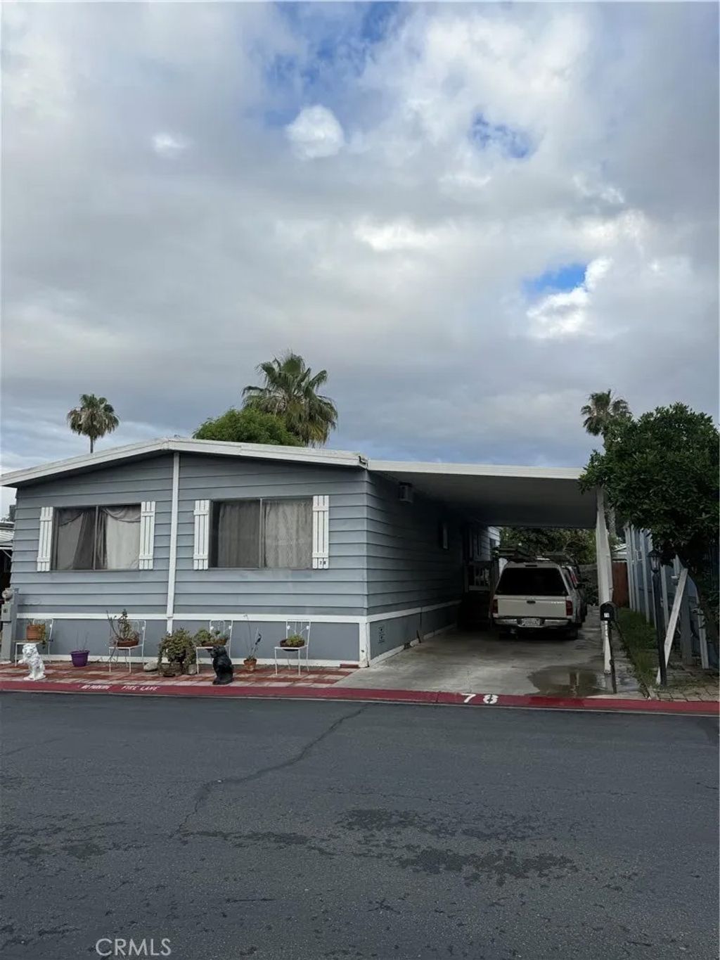 Photo of 995 Pomona Rd #78, Corona, CA 92882 (MLS # IV26084159)