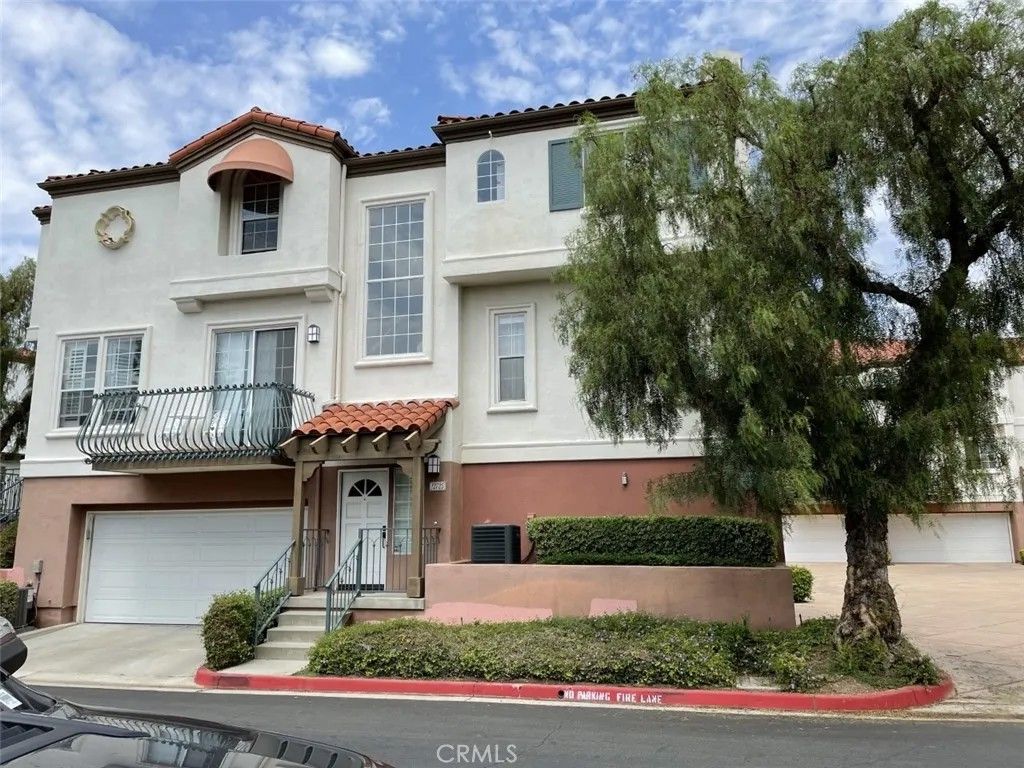 Photo of 12725 Trent Jones Ln, Tustin, CA 92782 (MLS # OC25270416)