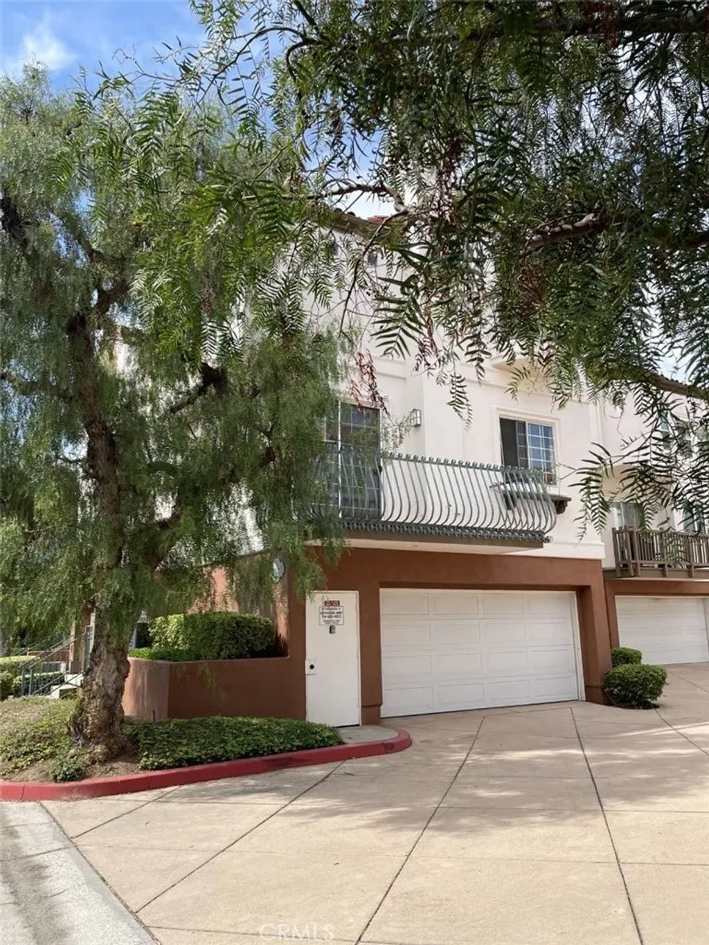 Photo of 12725 Trent Jones Ln, Tustin, CA 92782 (MLS # OC25270416)