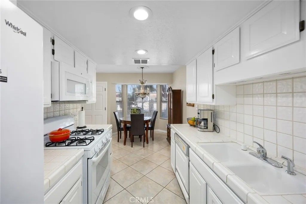 Photo of 10418 Bogardus Ave, Whittier, CA 90603 (MLS # PW26042948)