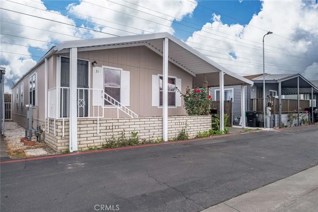 Photo of 16600 Downey Ave #31, Paramount, CA 90723 (MLS # PV26034453)