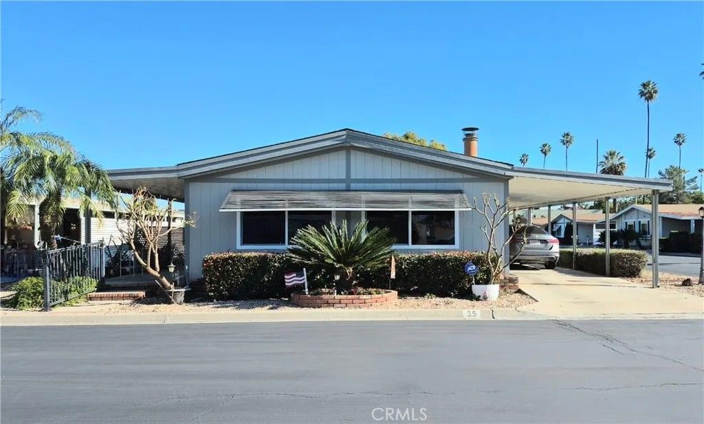 Photo of 13381 Magnolia Ave #35, Corona, CA 92879 (MLS # SW26009165)
