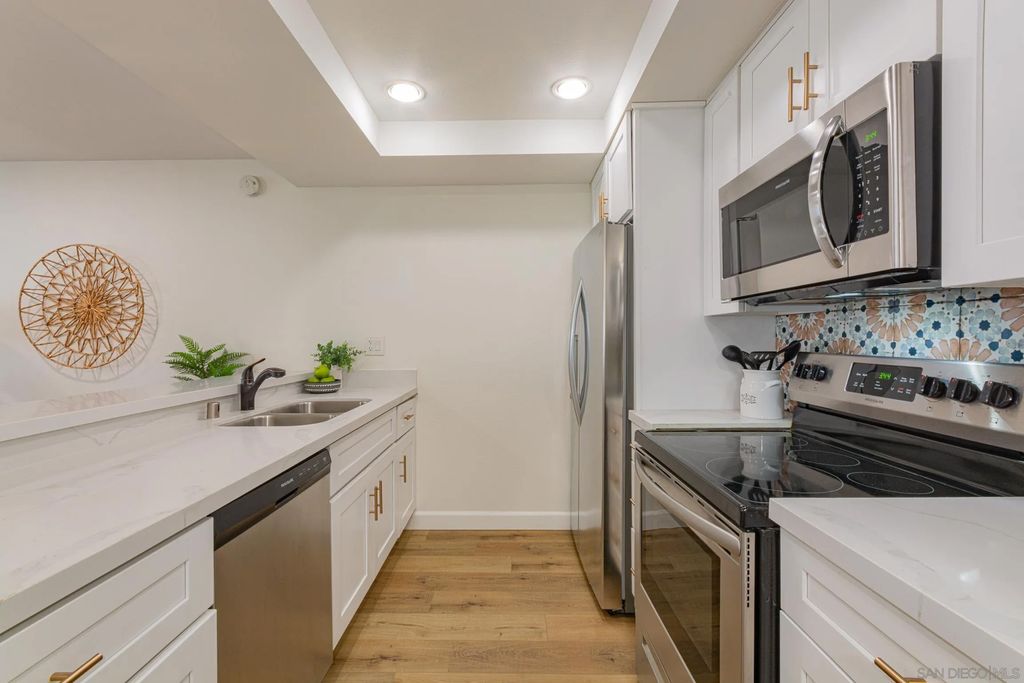 Photo of 10737 San Diego Mission #115, San Diego, CA 92108 (MLS # 260014113)