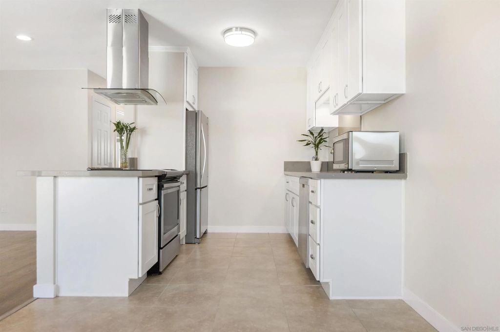 Photo of 9504 Carroll Canyon Rd #202, San Diego, CA 92126 (MLS # 260004878)